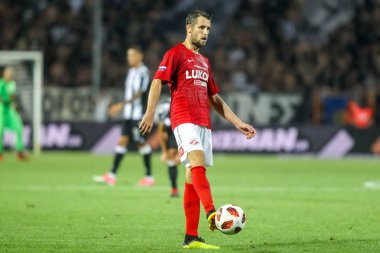 Thessaloniki, Yunanistan - 8 Ağustos 2018: Oyuncu, Spartak Dmitri Kombarov Uefa Şampiyonlar Ligi üçüncü, Paok rakip Spartak Moskova Toumba Stadyumu'nda arasında ön eleme turu sırasında eylem