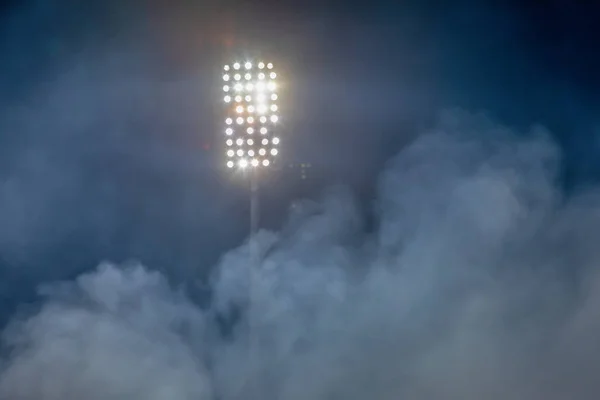 Stadium lights and smoke — Stock Photo, Image