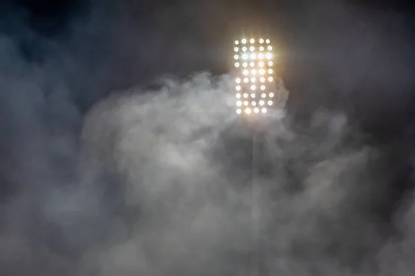 Stadium lights and smoke — Stock Photo, Image