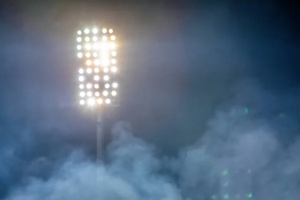 Stadium lights and smoke — Stock Photo, Image