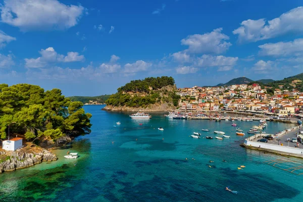 Aerial cityscape view of the coastal city of Parga, Greece durin