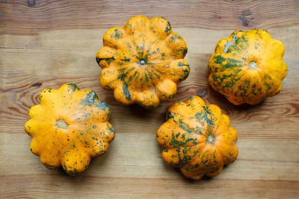 Harvest of yellow squashes on the table