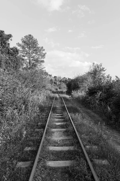 Black and white picture of desert railroad located between Kalaw and Inle Lake in Myanmar