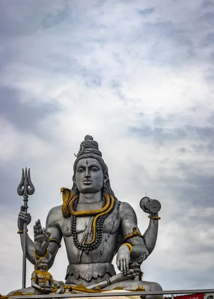 shiva statue isolated at murdeshwar temple close up shots image is take at murdeshwar karnataka india at early morning. it is one of the tallest shiva statue in the world.