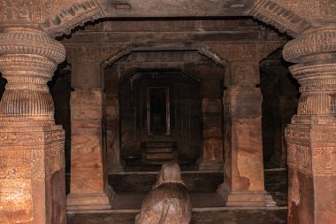badami cave temple interior pillars stone art in details image is taken at badami karnataka india. it is unesco heritage site and place of amazing chalukya dynasty sotne art. clipart