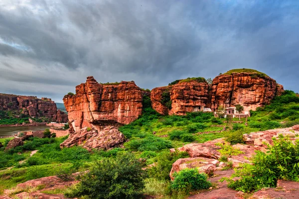 mountainous landscape with dramatic sky at morning from flat angle shot image is showing the beauty of badami karnataka india.