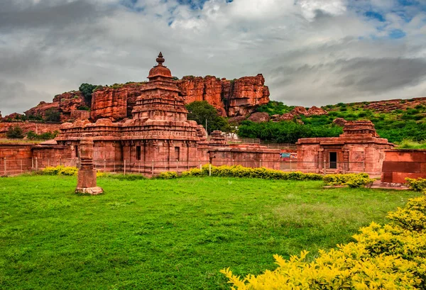 ancient temple with holly religious lake and mountain background at morning image is showing the beauty of Bhutanatha Temple at Badami karnataka india.