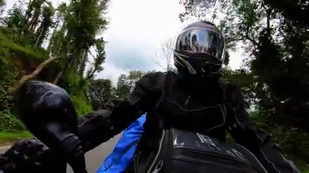 Motorcycle Ridding Front Angle Twisty Mountain Road Lush Green Forests — Stock Video