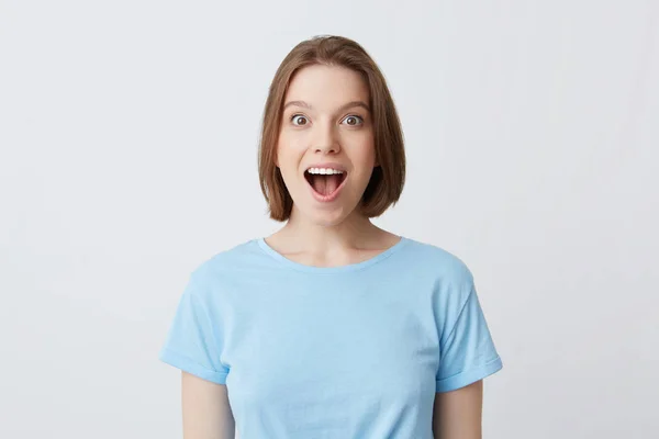 Closeup Amazed Young Woman Opening Mouth Blue Shirt Looks Happy — Stok Foto