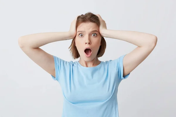 Closeup Amazed Young Woman Blue Shirt Standing Open Mouth Hands — Stok Foto