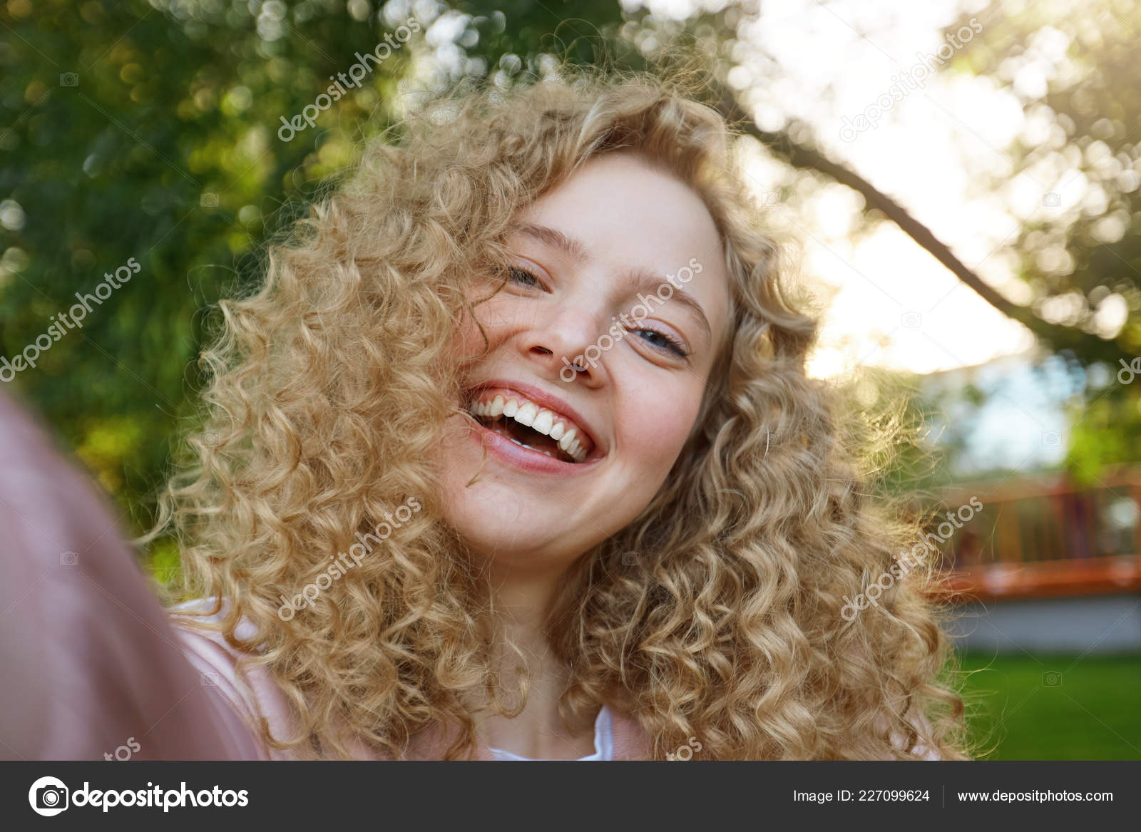 Young Beautiful Funny Cool Girl Blonde Curly Hair Widely Smiling