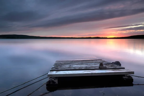Wooden Raft Calm Lake Sunset Sweden Stock Image