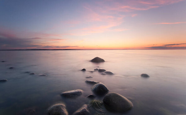 Beautiful sunset over a calm ocean in the southern of sweden, scandinavia
