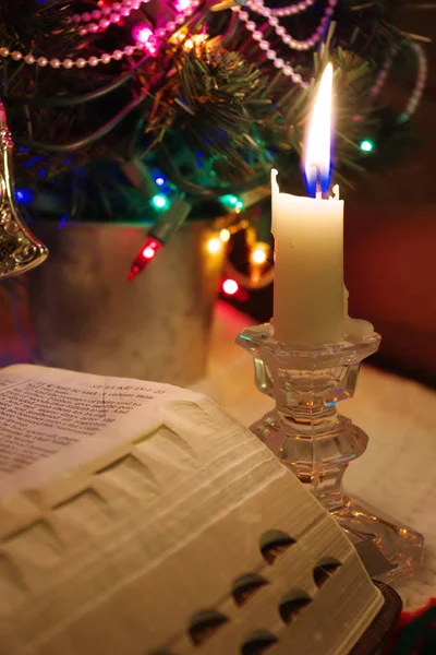 Reading Holy Bible Candlelight Festive Lights Christmas Time — Stock Photo, Image