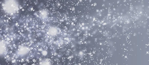 Tender blue winter background with snowflakes. New Year\'s atmosphere.2020 new year.