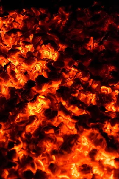 Hot and burning coals in a brazier at night. — Stock Photo, Image