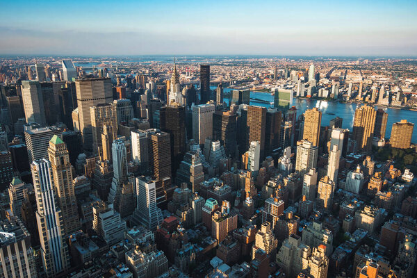 Manhattan skyline showing landmark buildings by day in New York City, United States of America (USA).