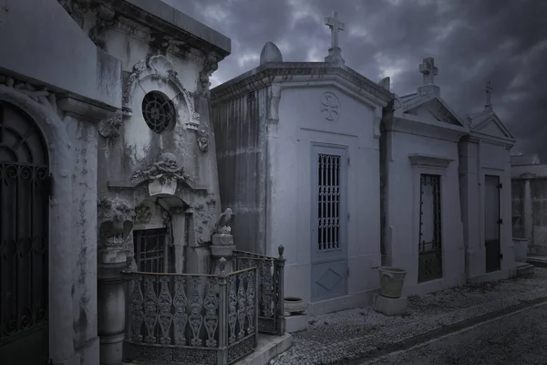 Creepy old european cemetery at dusk or night
