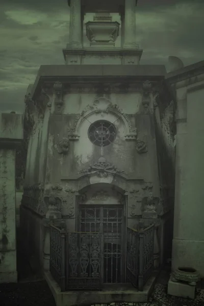 Mysterious and creepy old cemetery tomb