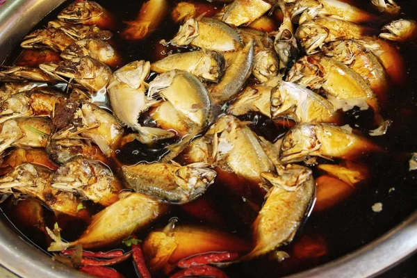 Boiled mackerel in soup at street food