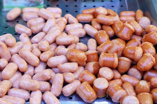 Fried sausage is delicious at street food — Stock Photo, Image