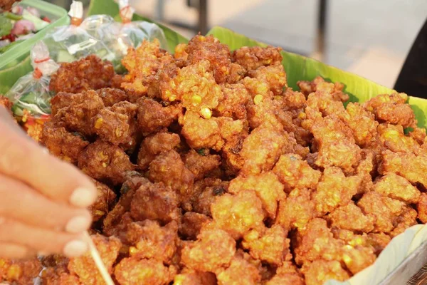 Fried corn cake is delicious at street food