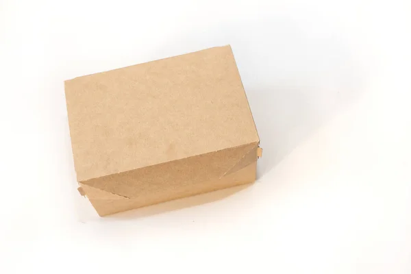 Dostawa, przenoszenie i recykling. Pudełko kartonowe izolowane na białym tle widok z góry — Zdjęcie stockowe