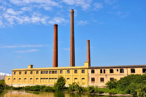 smokestacks of an abandoned pasta factory in Imperia Italy