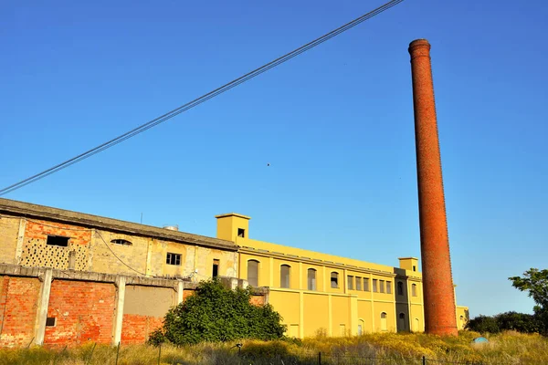 smokestacks of an abandoned pasta factory in Imperia Italy