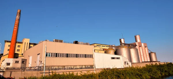 smokestacks of an abandoned pasta factory in Imperia Italy