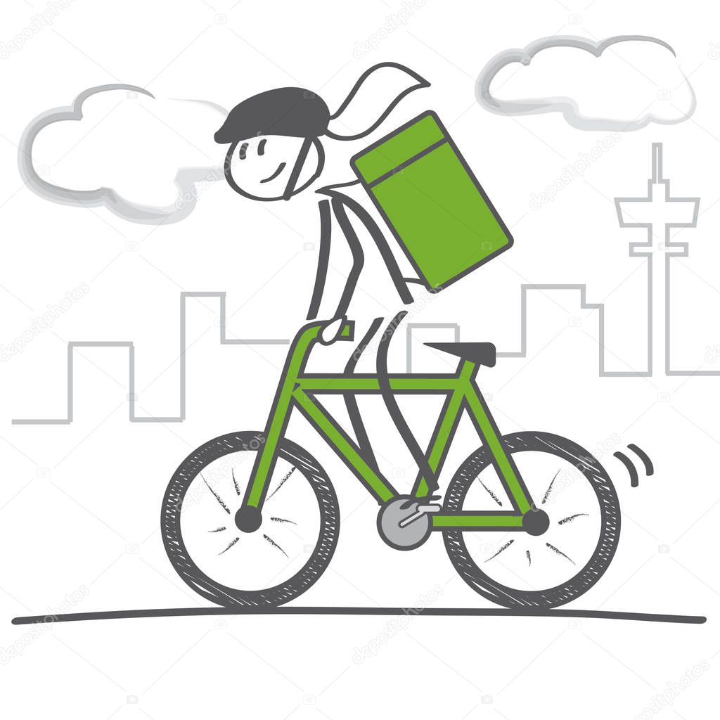 female cyclist with courier bag on street