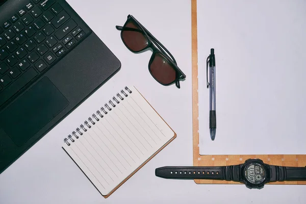 Flat lay, top view minimalist office table desk. Workspace on white background with space for text