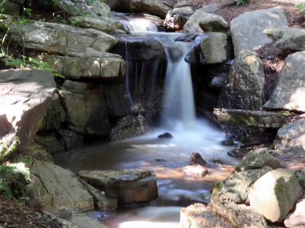 A waterfall in a small stream frozen in time