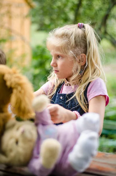 Adorable Blond Girl Long Hair Playing Fluffy Toys — Stock Photo, Image