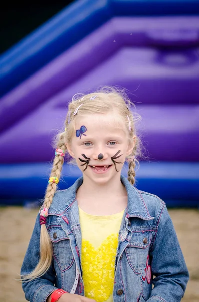 Adorable Blond Girl Portrait Doing Face Painting — Stock Photo, Image