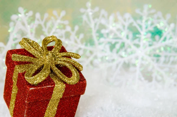 Shining Red Christmas Box Surprise Golden Background — Stock Photo, Image