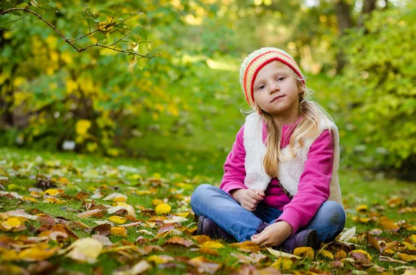 Adorable child in beautiful colorful park — Stock Photo, Image