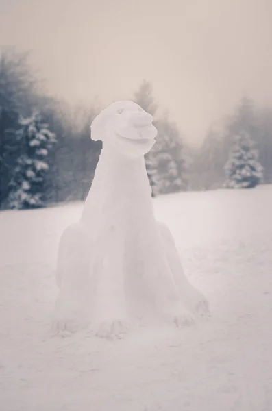 dog statue made from snow