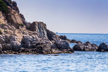 Spain, Catalonia, July 2018. Travel by boat Costa Brava: Calella, Pineda, Santa Susanna. Malgrat de Mar, Blanes, Santa Cristina, Lloret de Mar, Tossa.