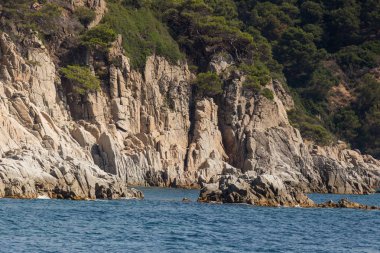 Spain, Catalonia, July 2018. Travel by boat Costa Brava: Calella, Pineda, Santa Susanna. Malgrat de Mar, Blanes, Santa Cristina, Lloret de Mar, Tossa.
