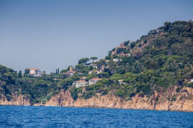 Spain, Catalonia, July 2018. Travel by boat Costa Brava: Calella, Pineda, Santa Susanna. Malgrat de Mar, Blanes, Santa Cristina, Lloret de Mar, Tossa.
