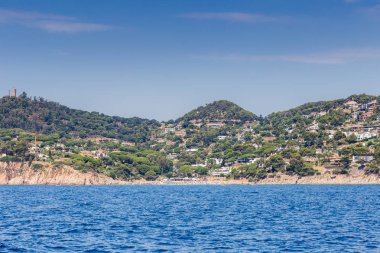 Spain, Catalonia, July 2018. Travel by boat Costa Brava: Calella, Pineda, Santa Susanna. Malgrat de Mar, Blanes, Santa Cristina, Lloret de Mar, Tossa.