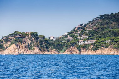 Spain, Catalonia, July 2018. Travel by boat Costa Brava: Calella, Pineda, Santa Susanna. Malgrat de Mar, Blanes, Santa Cristina, Lloret de Mar, Tossa.