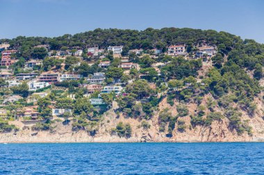 Spain, Catalonia, July 2018. Travel by boat Costa Brava: Calella, Pineda, Santa Susanna. Malgrat de Mar, Blanes, Santa Cristina, Lloret de Mar, Tossa.