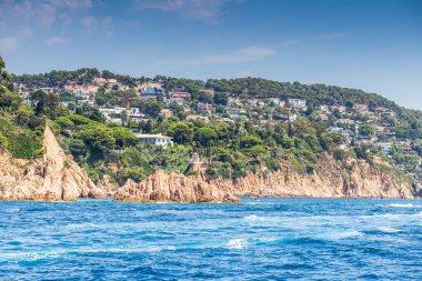 Spain, Catalonia, July 2018. Travel by boat Costa Brava: Calella, Pineda, Santa Susanna. Malgrat de Mar, Blanes, Santa Cristina, Lloret de Mar, Tossa.