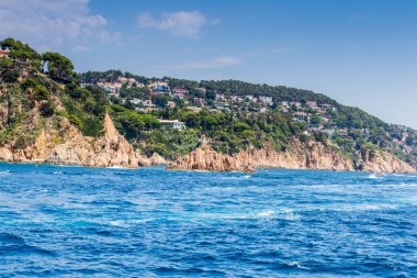 Spain, Catalonia, July 2018. Travel by boat Costa Brava: Calella, Pineda, Santa Susanna. Malgrat de Mar, Blanes, Santa Cristina, Lloret de Mar, Tossa.