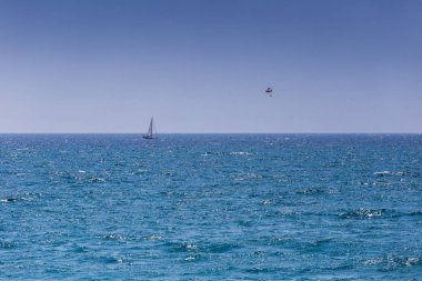 Spain, Catalonia, July 2018. Travel by boat Costa Brava: Calella, Pineda, Santa Susanna. Malgrat de Mar, Blanes, Santa Cristina, Lloret de Mar, Tossa. clipart