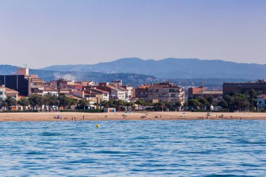 Spain, Catalonia, July 2018. Travel by boat Costa Brava: Calella, Pineda, Santa Susanna. Malgrat de Mar, Blanes, Santa Cristina, Lloret de Mar, Tossa.
