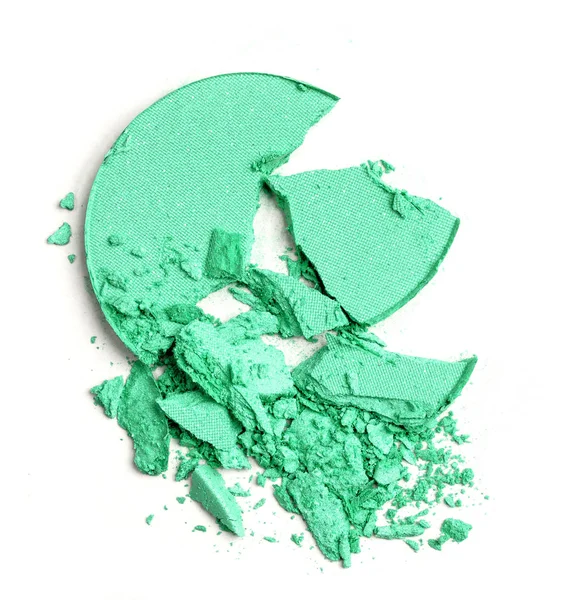 mint green color broken powder foundation isolated on white