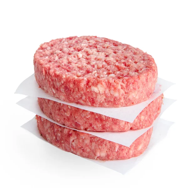 白で隔離されたハンバーガーを調理するための3つのひき肉スライス — ストック写真